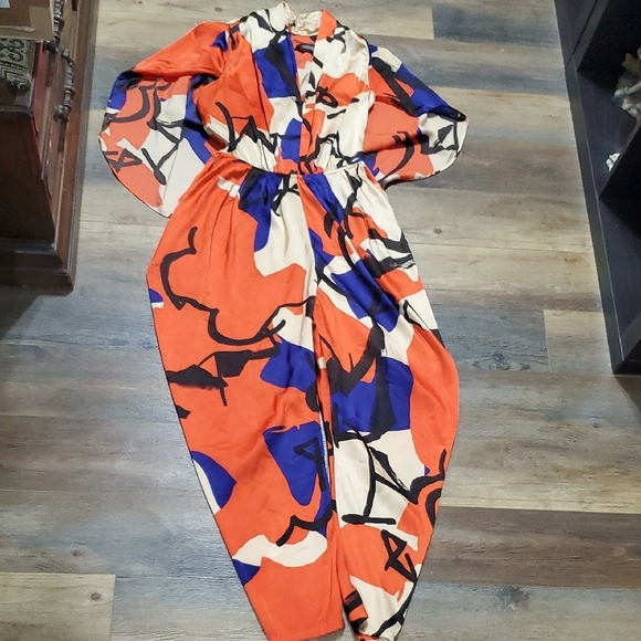 Vibrant Red and Blue Caped Jumpsuit with Abstract Print - Picture 2 of 8